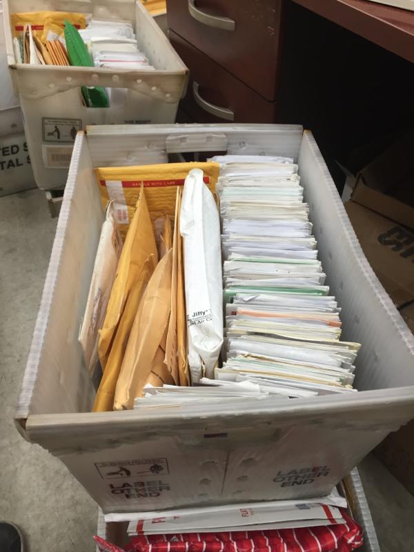 Image of Box Of Mail-Packages And Mail